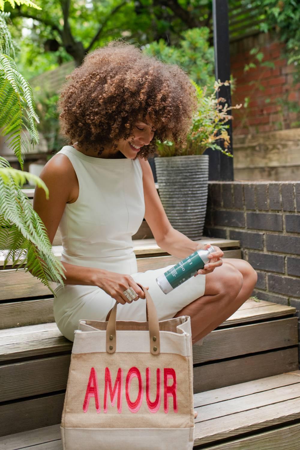 Woman showcasing product